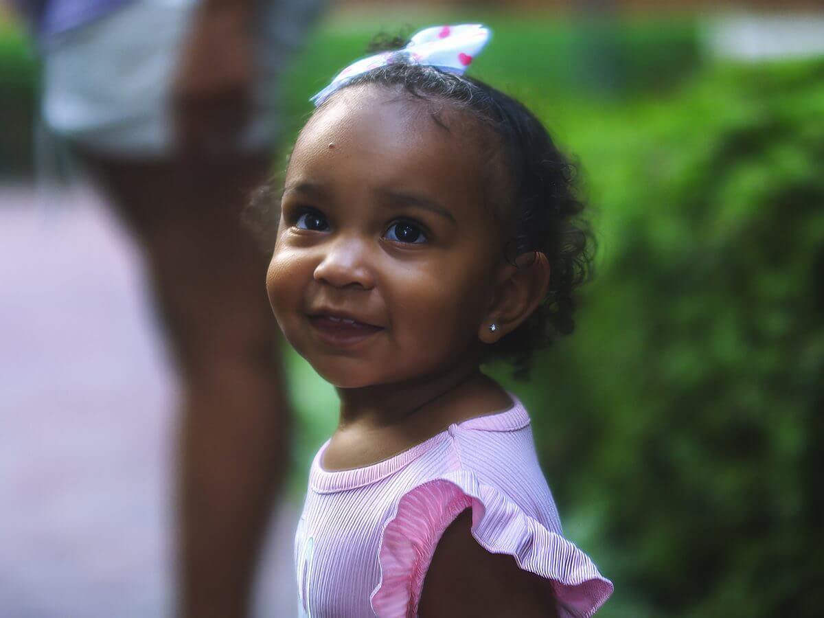 A child in the garden at Room At The Inn